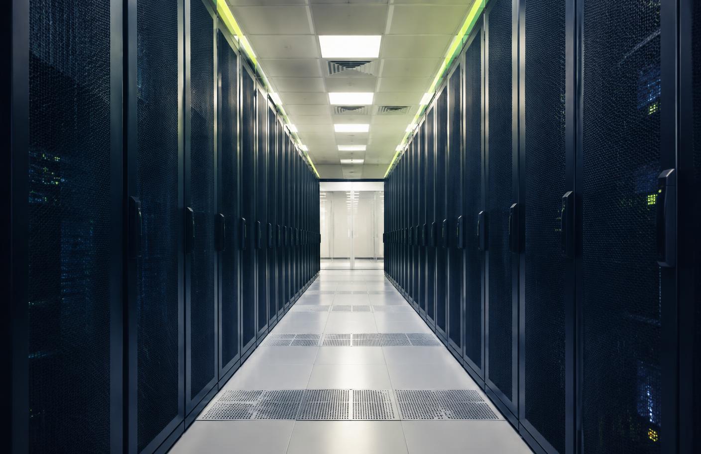 A data centre corridor lined with server racks